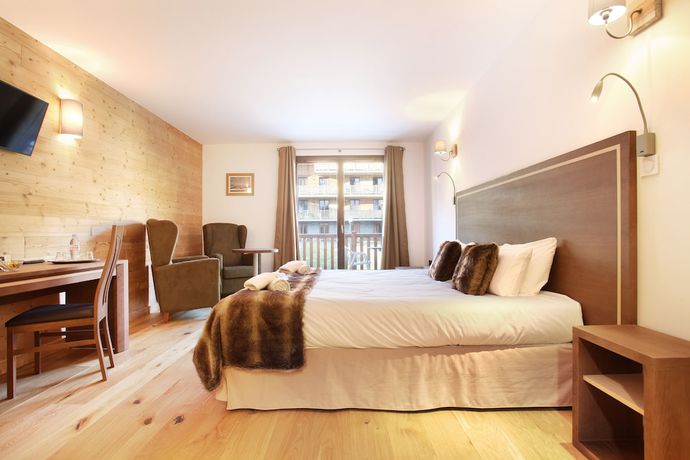 Imagen de la habitación del Hotel H&ocirc;tel Prestige Odalys Le Chamois. Foto 11