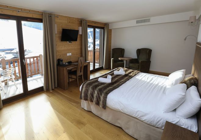 Imagen de la habitación del Hotel H&ocirc;tel Prestige Odalys Le Chamois. Foto 12