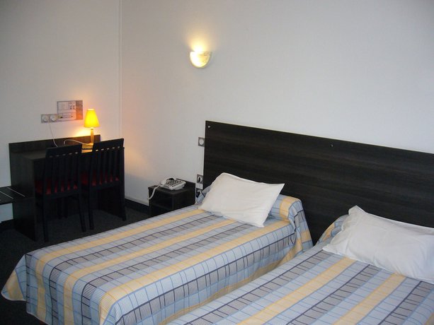 Imagen de la habitación del Hotel H&ocirc;tel Printania Lourdes. Foto 8