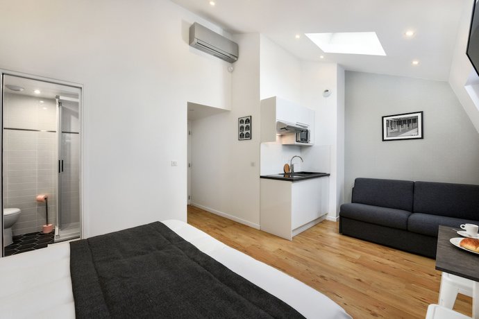 Imagen de la habitación del Hotel H&ocirc;tel R&eacute;sidence Montebello. Foto 7