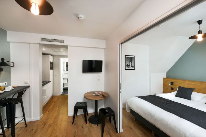 Imagen de la habitación del Hotel H&ocirc;tel R&eacute;sidence Montebello. Foto 20