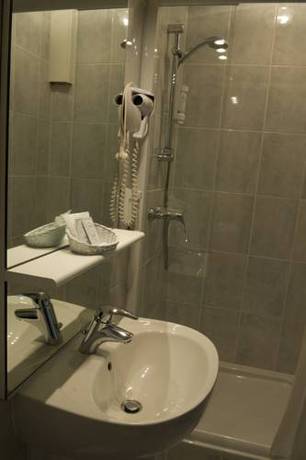 Imagen de la habitación del Hotel H&ocirc;tel Restaurant Des Remparts. Foto 2