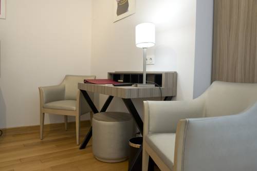 Imagen de la habitación del Hotel H&ocirc;tel Restaurant Des Remparts. Foto 13