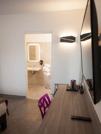 Imagen de la habitación del Hotel Hôtel Restaurant L\'Horloge Gourmande. Foto 5