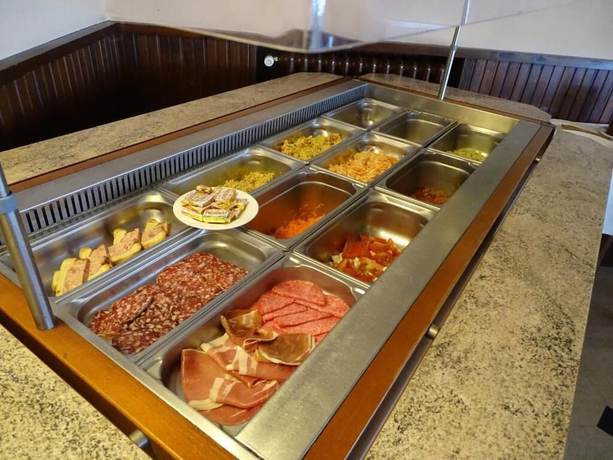 Imagen del bar/restaurante del Hotel Hôtel Restaurant Le Cheval Blanc. Foto 4