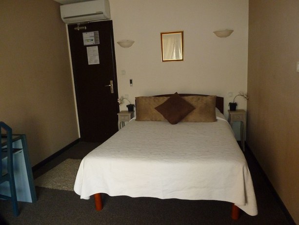 Imagen de la habitación del Hotel H&ocirc;tel Restaurant Le Commerce, Auriol. Foto 3