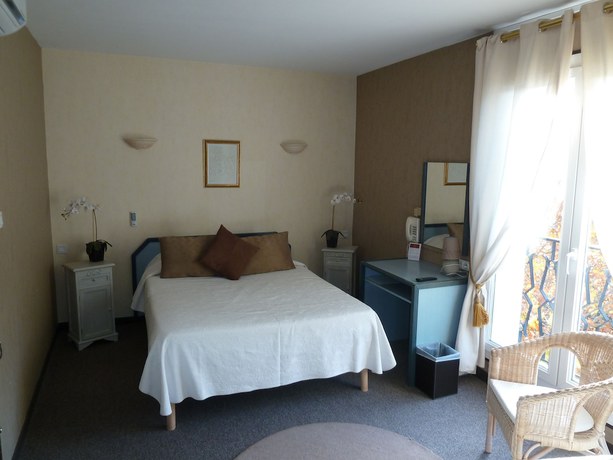 Imagen de la habitación del Hotel H&ocirc;tel Restaurant Le Commerce, Auriol. Foto 4