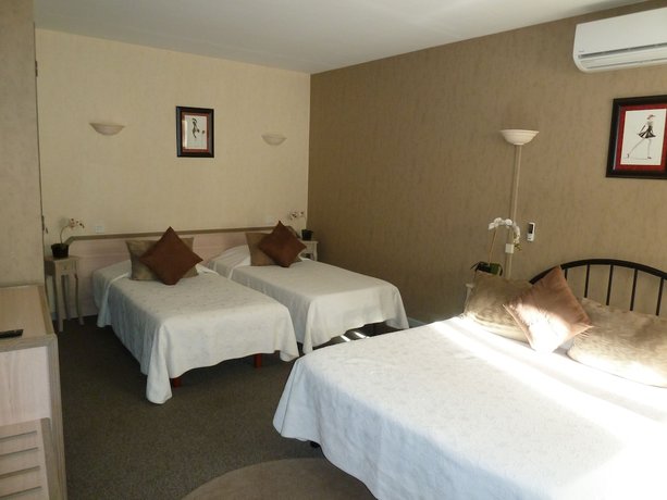 Imagen de la habitación del Hotel H&ocirc;tel Restaurant Le Commerce, Auriol. Foto 6