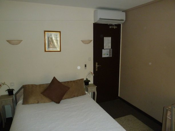 Imagen de la habitación del Hotel H&ocirc;tel Restaurant Le Commerce, Auriol. Foto 8