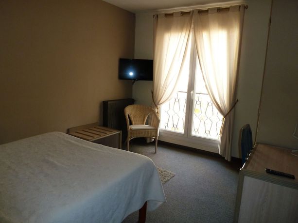 Imagen de la habitación del Hotel H&ocirc;tel Restaurant Le Commerce, Auriol. Foto 11