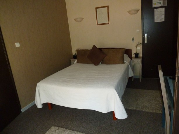 Imagen de la habitación del Hotel H&ocirc;tel Restaurant Le Commerce, Auriol. Foto 16