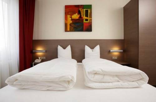 Imagen de la habitación del Hotel Hôtel Restaurant Tivoli - Basel Airport. Foto 5