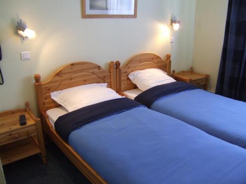 Imagen de la habitación del Hotel Hôtel Restaurant Wolf. Foto 8