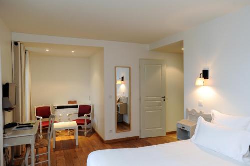 Imagen de la habitación del Hotel H&ocirc;tel Restaurant & Spa La Maison Oppoca. Foto 7