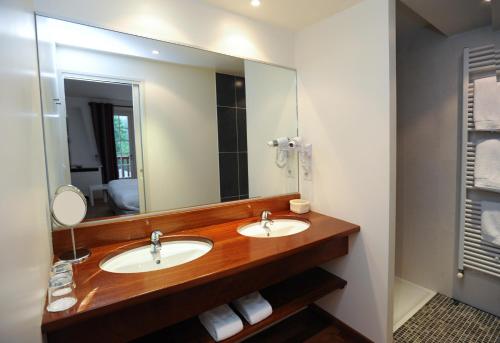 Imagen de la habitación del Hotel H&ocirc;tel Restaurant & Spa La Maison Oppoca. Foto 8
