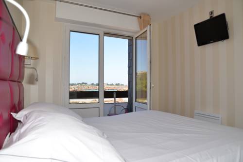 Imagen de la habitación del Hotel H&ocirc;tel Saint Guirec Et De La Plage. Foto 5