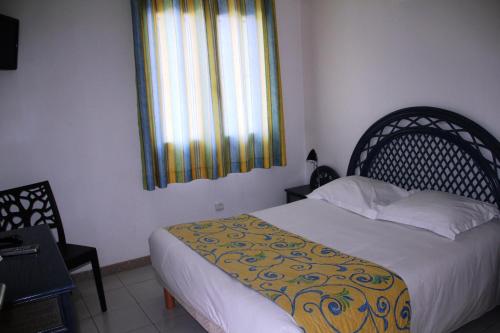 Imagen de la habitación del Hotel Hôtel Saint Louis. Foto 8