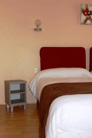 Imagen de la habitación del Hotel H&ocirc;tel Saint-hubert, Saint-Claude. Foto 7