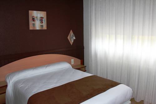 Imagen de la habitación del Hotel H&ocirc;tel Saint-hubert, Saint-Claude. Foto 16