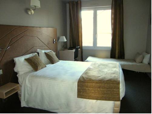 Imagen de la habitación del Hotel H&ocirc;tel Saint-pierre. Foto 9