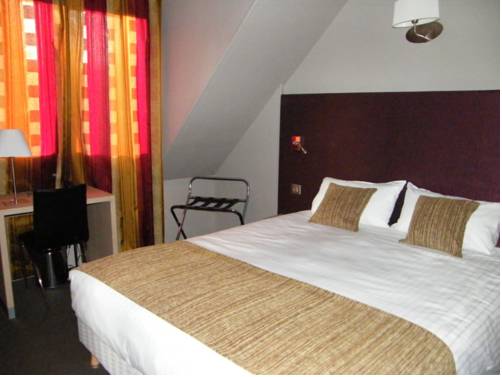 Imagen de la habitación del Hotel H&ocirc;tel Saint-pierre. Foto 13