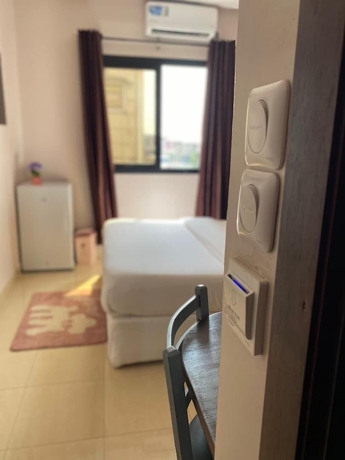 Imagen de la habitación del Hotel H&ocirc;tel TOMEDI. Foto 2