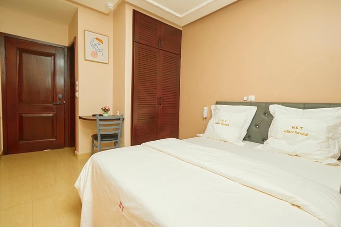Imagen de la habitación del Hotel H&ocirc;tel TOMEDI. Foto 6