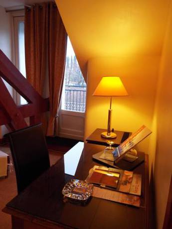 Imagen de la habitación del Hotel Hôtel Terminus, Cahors. Foto 15