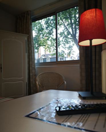 Imagen de la habitación del Hotel H&ocirc;tel Trianon, Tours. Foto 15