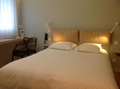 Imagen de la habitación del Hotel H&ocirc;tel Vulcain. Foto 8