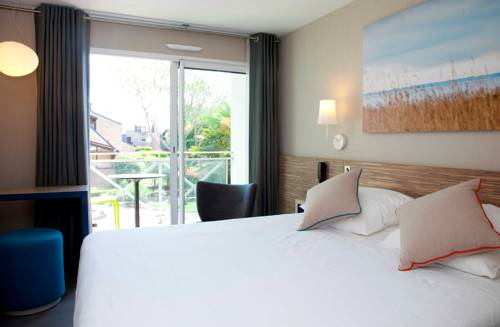 Imagen de la habitación del Hotel H&ocirc;tel & Spa Les Salines By Thalazur Carnac. Foto 10