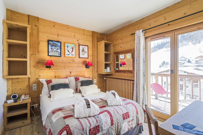 Imagen de la habitación del Hotel H&ocirc;tel and Chalets Le Samovar. Foto 17