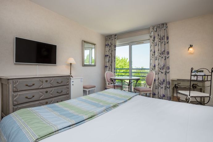 Imagen de la habitación del Hotel H&ocirc;tel and Restaurant L\'Ermitage. Foto 15