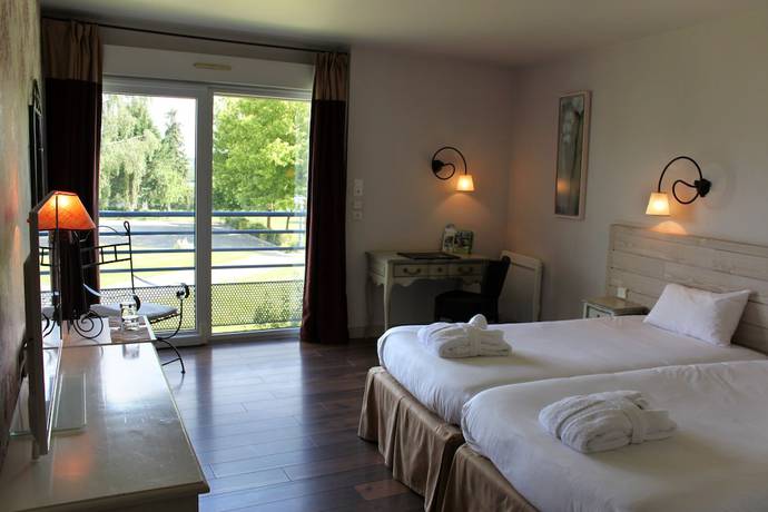 Imagen de la habitación del Hotel H&ocirc;tel and Restaurant L\'Ermitage. Foto 19