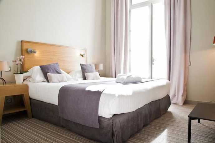 Imagen de la habitación del Hotel Hôtel and Spa du Château. Foto 4