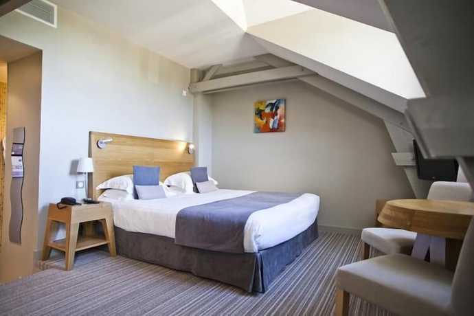 Imagen de la habitación del Hotel Hôtel and Spa du Château. Foto 7