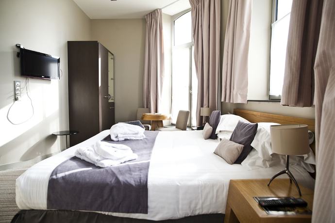 Imagen de la habitación del Hotel Hôtel and Spa du Château. Foto 15