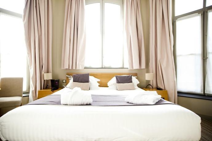 Imagen de la habitación del Hotel Hôtel and Spa du Château. Foto 16