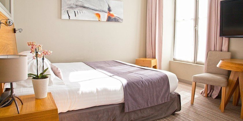 Imagen de la habitación del Hotel Hôtel and Spa du Château. Foto 17