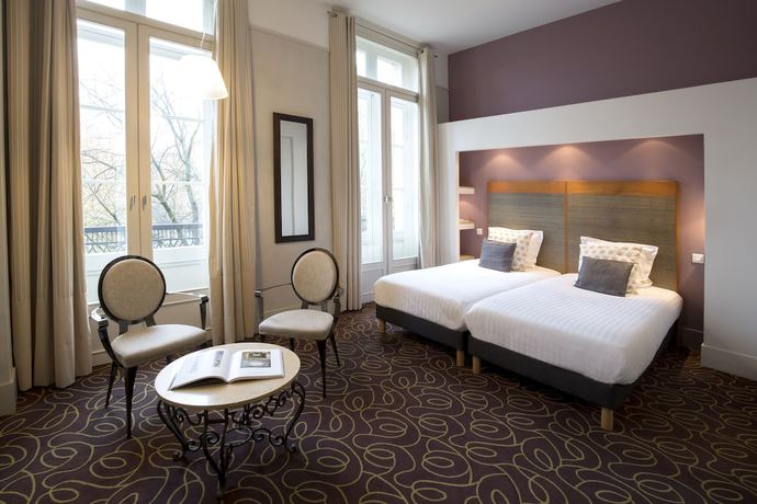 Imagen de la habitación del Hotel Hôtel de Normandie. Foto 11