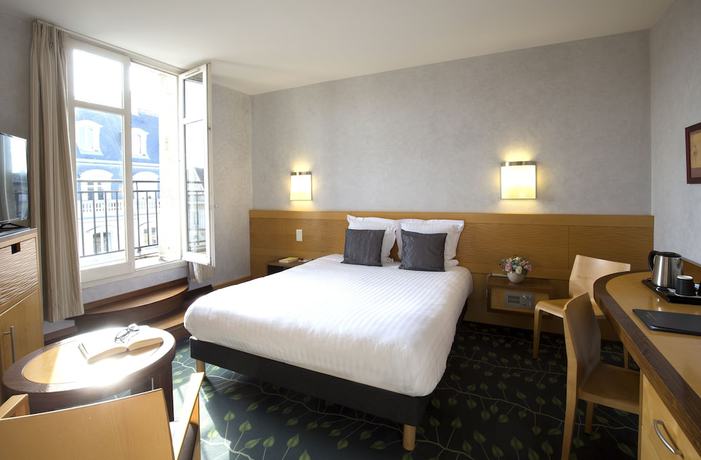 Imagen de la habitación del Hotel Hôtel de Normandie. Foto 16