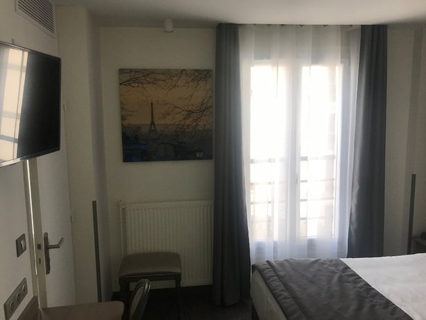 Imagen de la habitación del Hotel Hôtel de Paris Montmartre. Foto 7