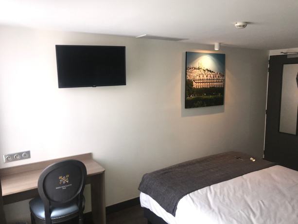 Imagen de la habitación del Hotel Hôtel de Paris Montmartre. Foto 10