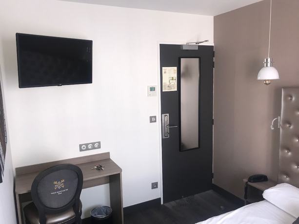 Imagen de la habitación del Hotel Hôtel de Paris Montmartre. Foto 15