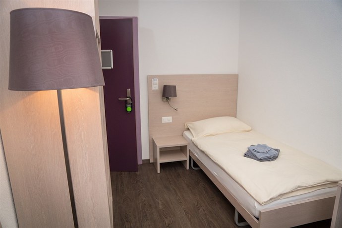 Imagen de la habitación del Hotel Hôtel de Ville le Sentier. Foto 2