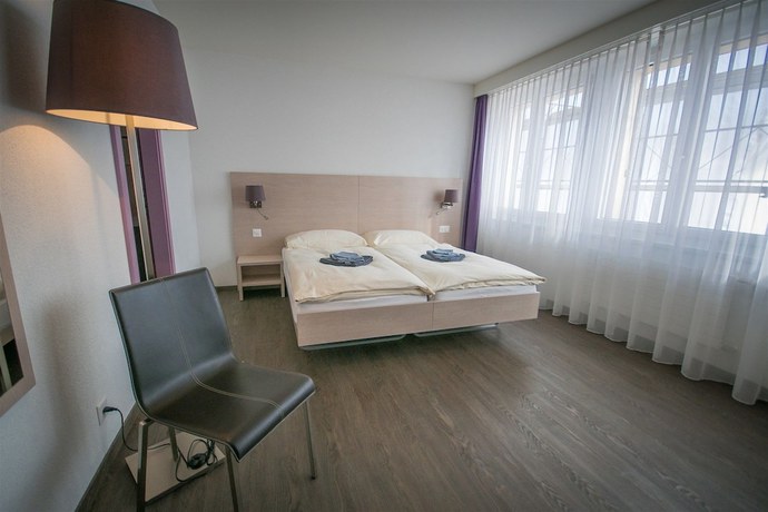 Imagen de la habitación del Hotel Hôtel de Ville le Sentier. Foto 3