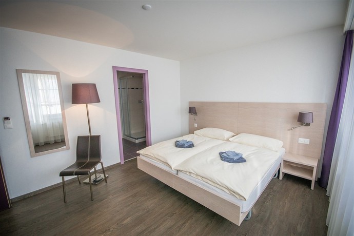 Imagen de la habitación del Hotel Hôtel de Ville le Sentier. Foto 4