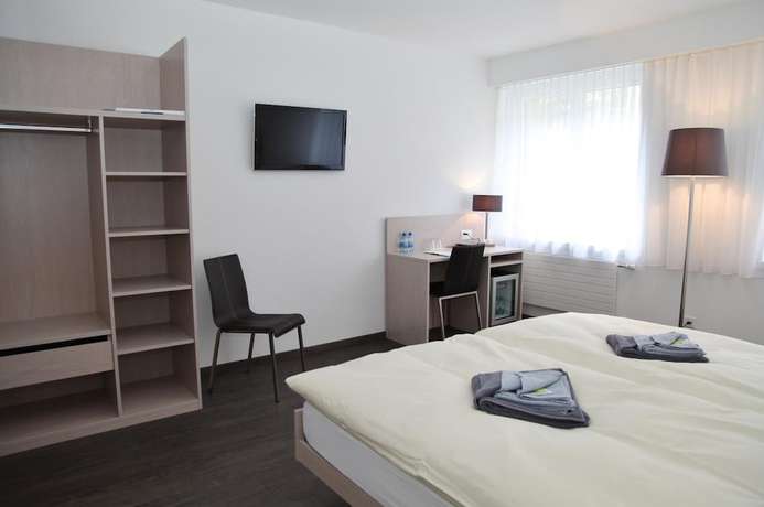 Imagen de la habitación del Hotel Hôtel de Ville le Sentier. Foto 5