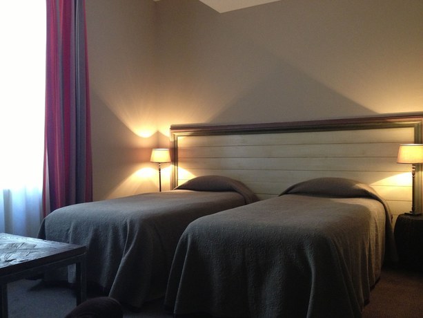 Imagen de la habitación del Hotel H&ocirc;tel de l\'Amphith&eacute;&acirc;tre. Foto 6
