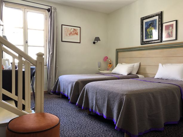 Imagen de la habitación del Hotel H&ocirc;tel de l\'Amphith&eacute;&acirc;tre. Foto 7